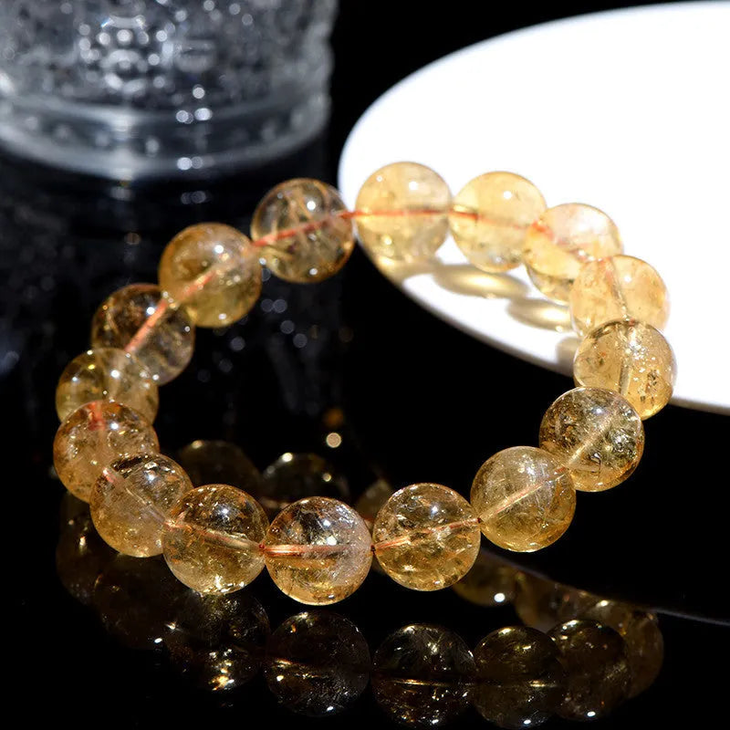 Natural yellow citrine bracelet showing geometry-shaped beads in single-circle configuration