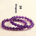 Natural Uruguay amethyst bracelet with scattered beads in four colour grades and eleven size options
