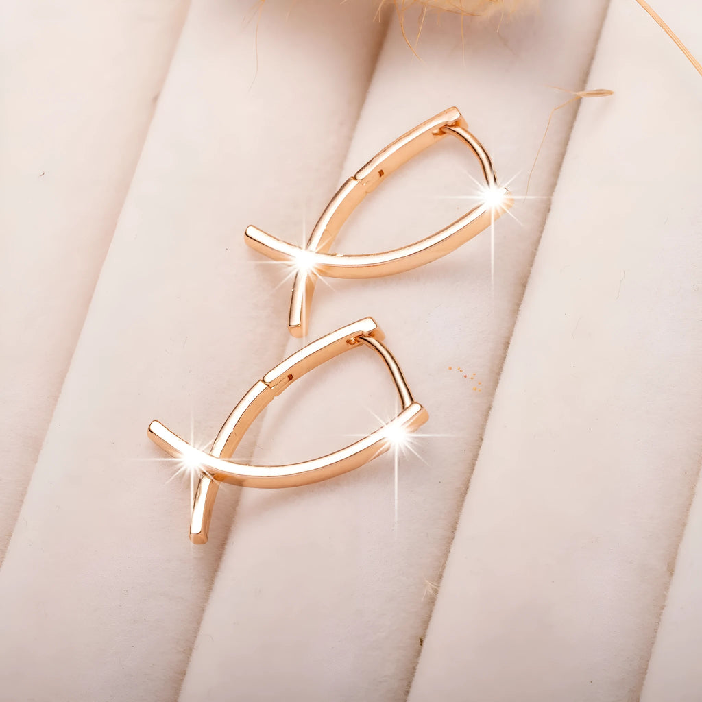 Rose gold plated copper cross shaped earrings with light luxury design