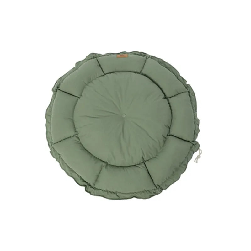 Grey reversible donut cat bed showing both raised rim side and flat sleeping side