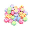 Assortment of 15mm frosted acrylic four-leaf clover craft beads in light colours.