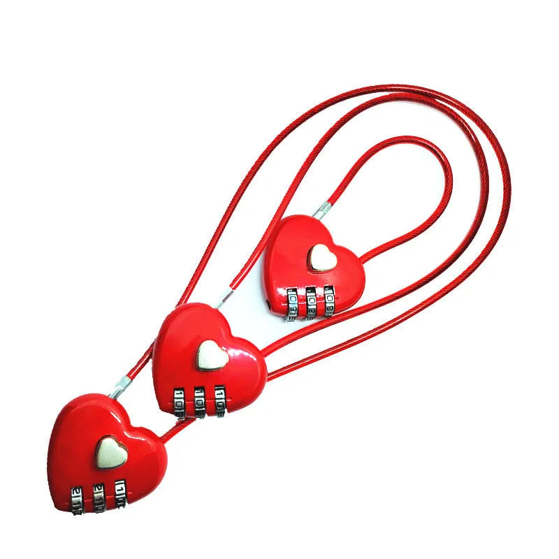 Peach heart love lock with long wire rope for bicycle helmet security in black colour on a white background