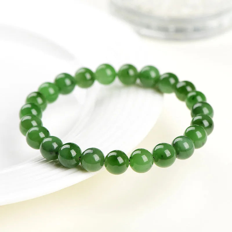 Natural Hetian jade jasper ball bracelet with polished beads, shown in multiple bead size options.