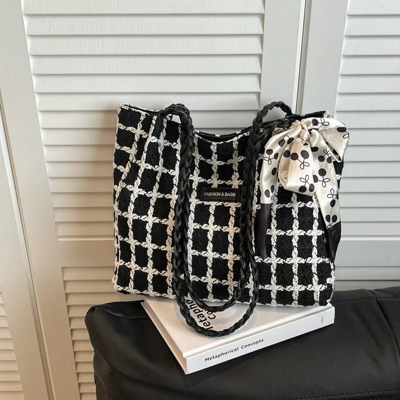 Woolen shoulder bag in black with horizontal square shape and sandwich pocket for commuting and shopping use