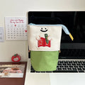 Brown Korean-style collapsible pencil case made from Oxford fabric, showing large capacity design.