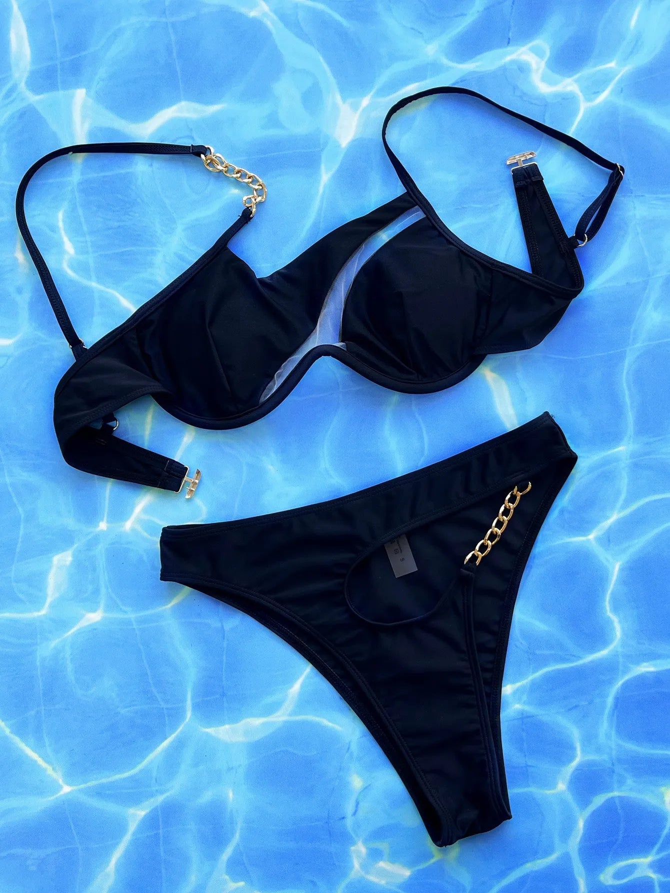 Women's hollow split swimsuit in black nylon two-piece set for swimming and wading