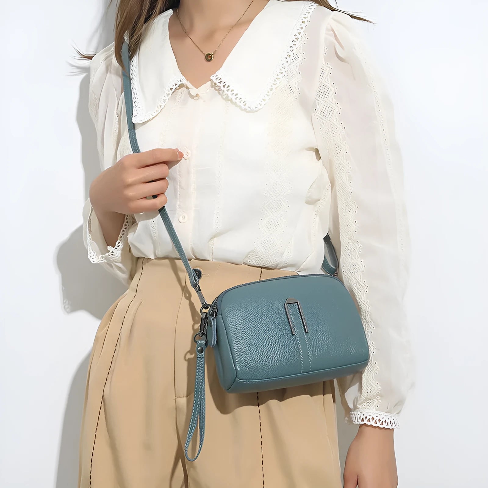 Genuine leather women's shoulder bag in horizontal square shape showing black colour option