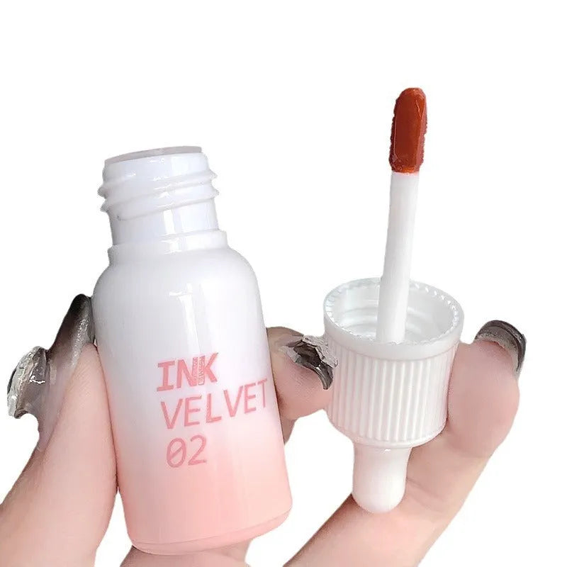 Mirror Lip Lacquer tube in 3.5g size from the Milk Huhoo series, showing shade options.