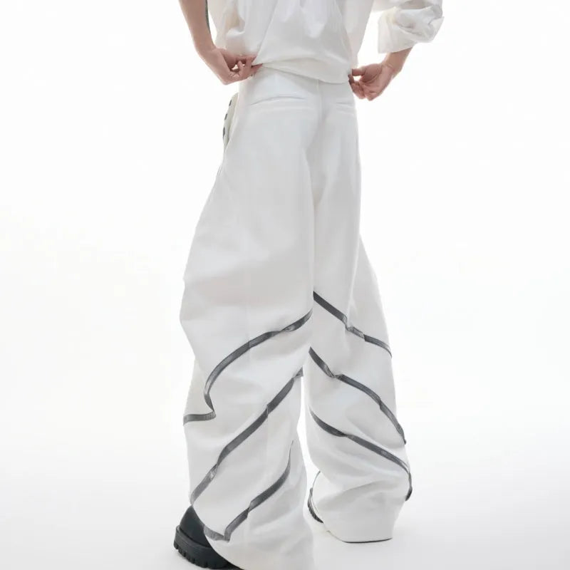 Men's trousers with three-dimensional cutting, metal striped rivet detailing and pleated design in polyester fabric