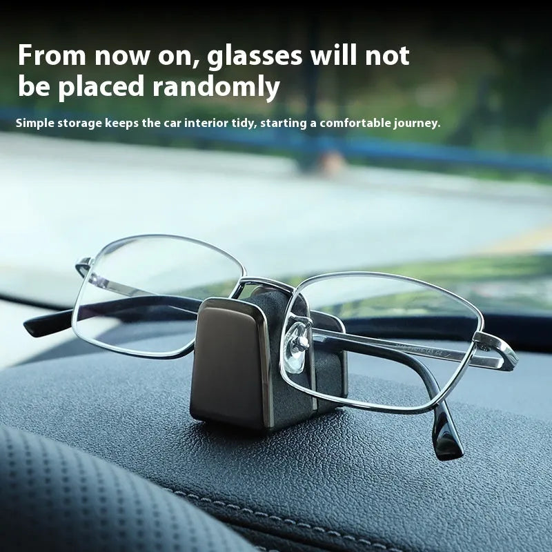 Zinc alloy car dashboard glasses holder in four colours measuring 3.7x3.2x2.5 cm