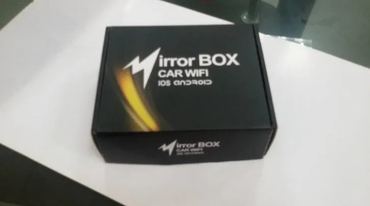 Black car mirror link Wi-Fi box with power cable, AV cable, antenna, and user manual for screen mirroring.