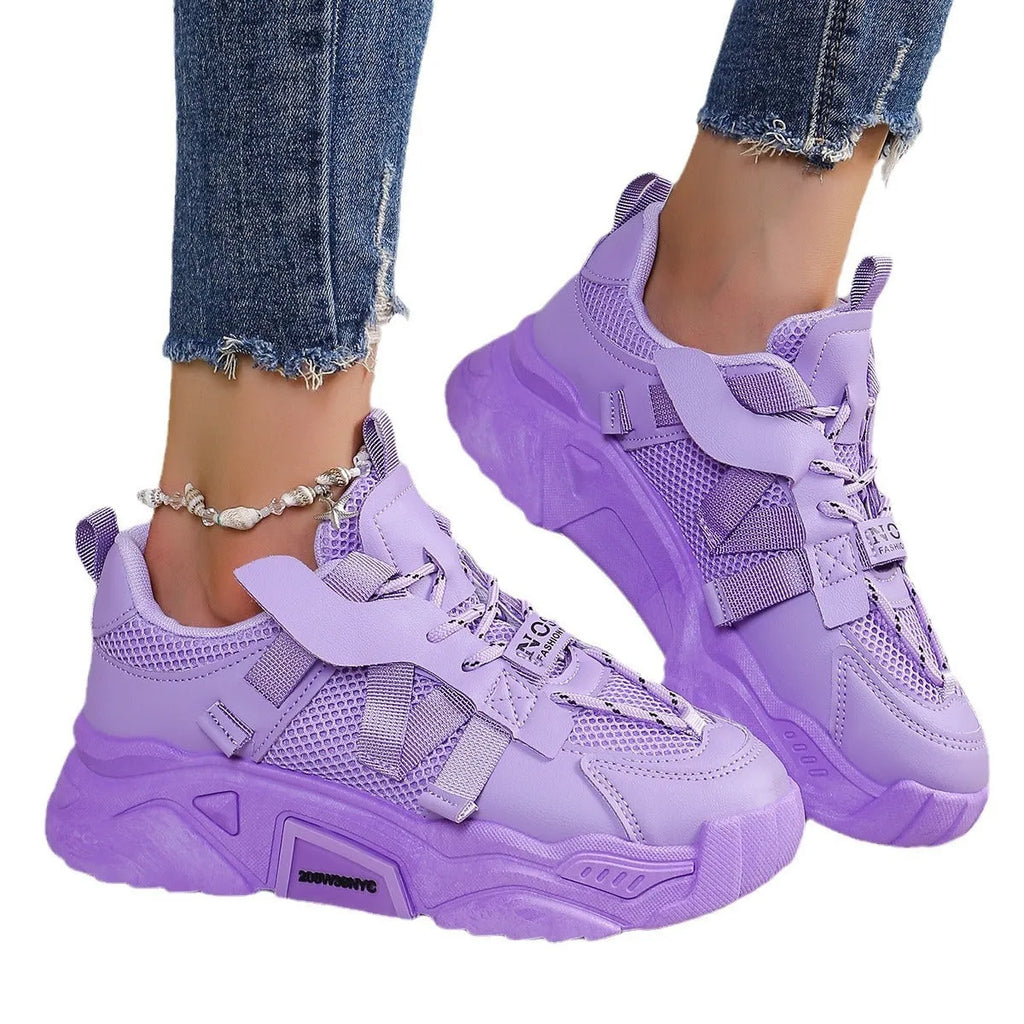 Women's platform sports sneakers in multiple colours with mesh upper and lace-up front.
