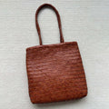 Handmade woven cowhide leather tote bag with three-dimensional pocket in brown colour