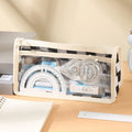 Transparent PVC pencil case with chessboard grid pattern showing pens inside, 21.5cm long