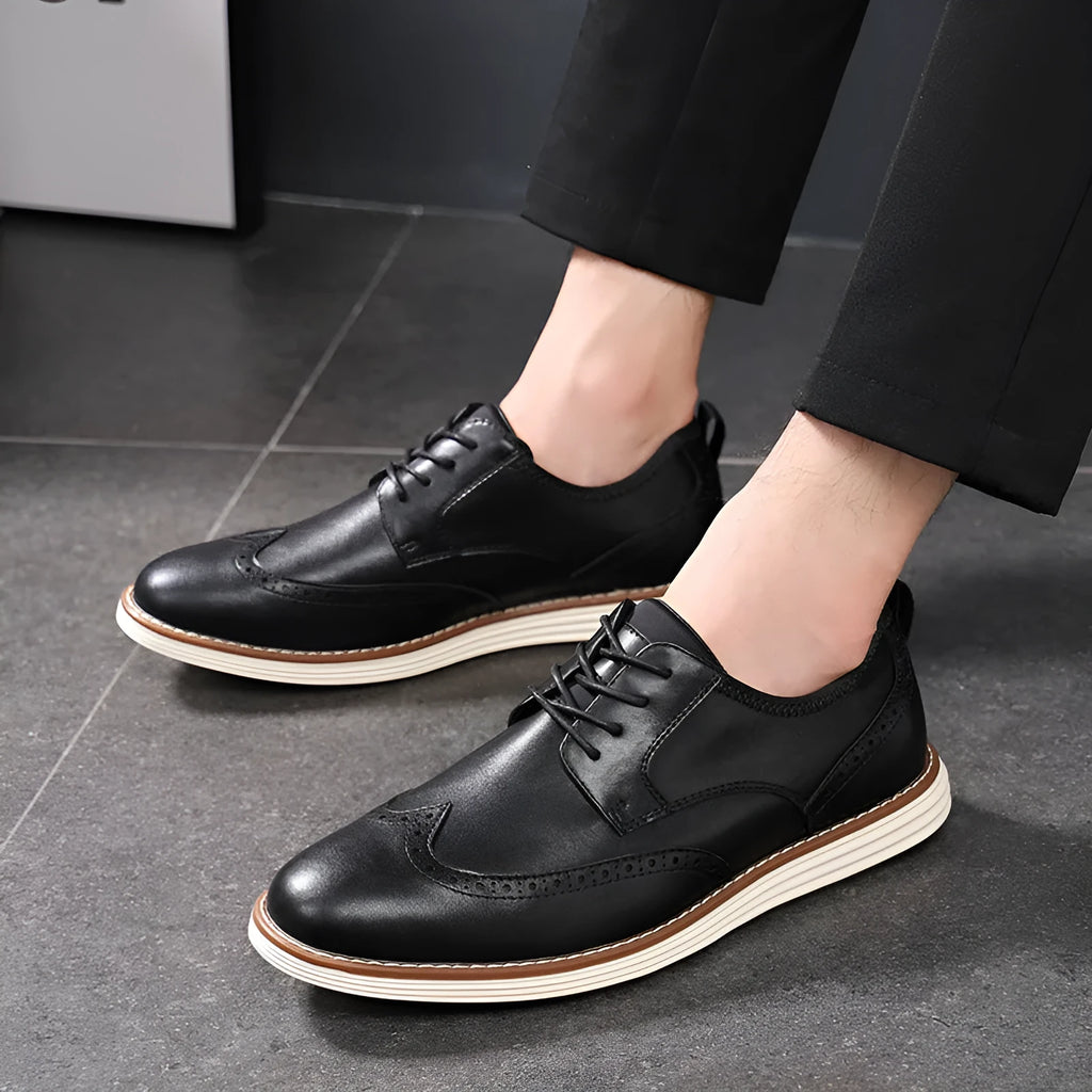 Men's black slip-on business casual shoes with round toe and low-cut PU upper on a TPR sole.