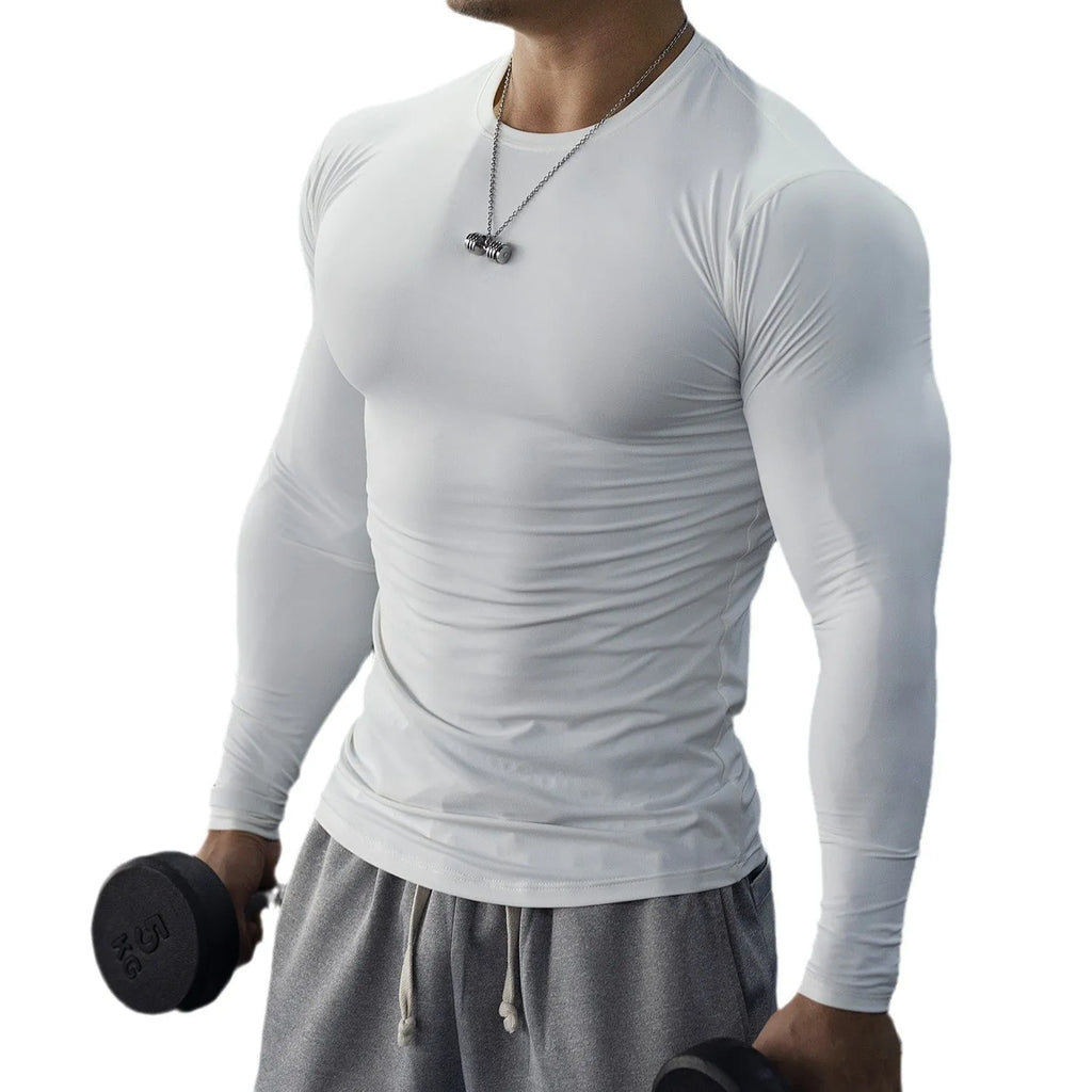 Man wearing black slim-fit long sleeve fitness tights for running or gym workout.