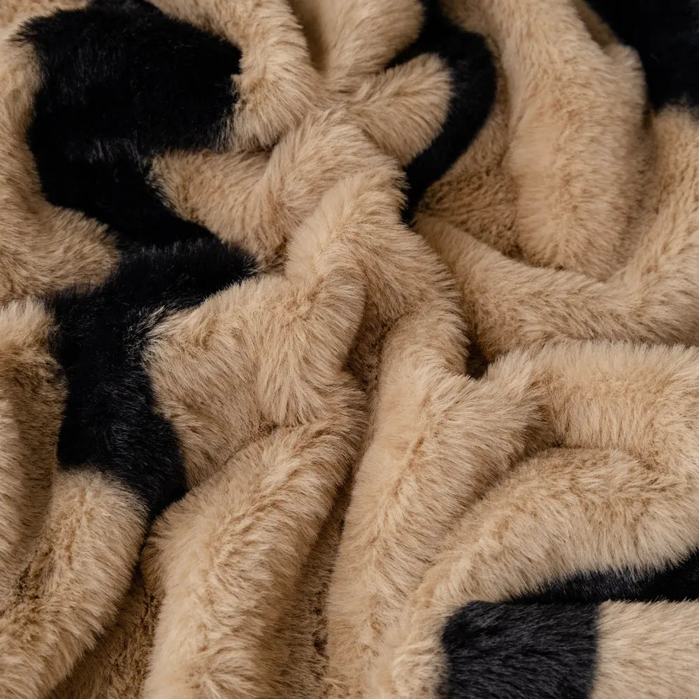 Zebra pattern flannel sofa cover with non-slip backing in caramel colour