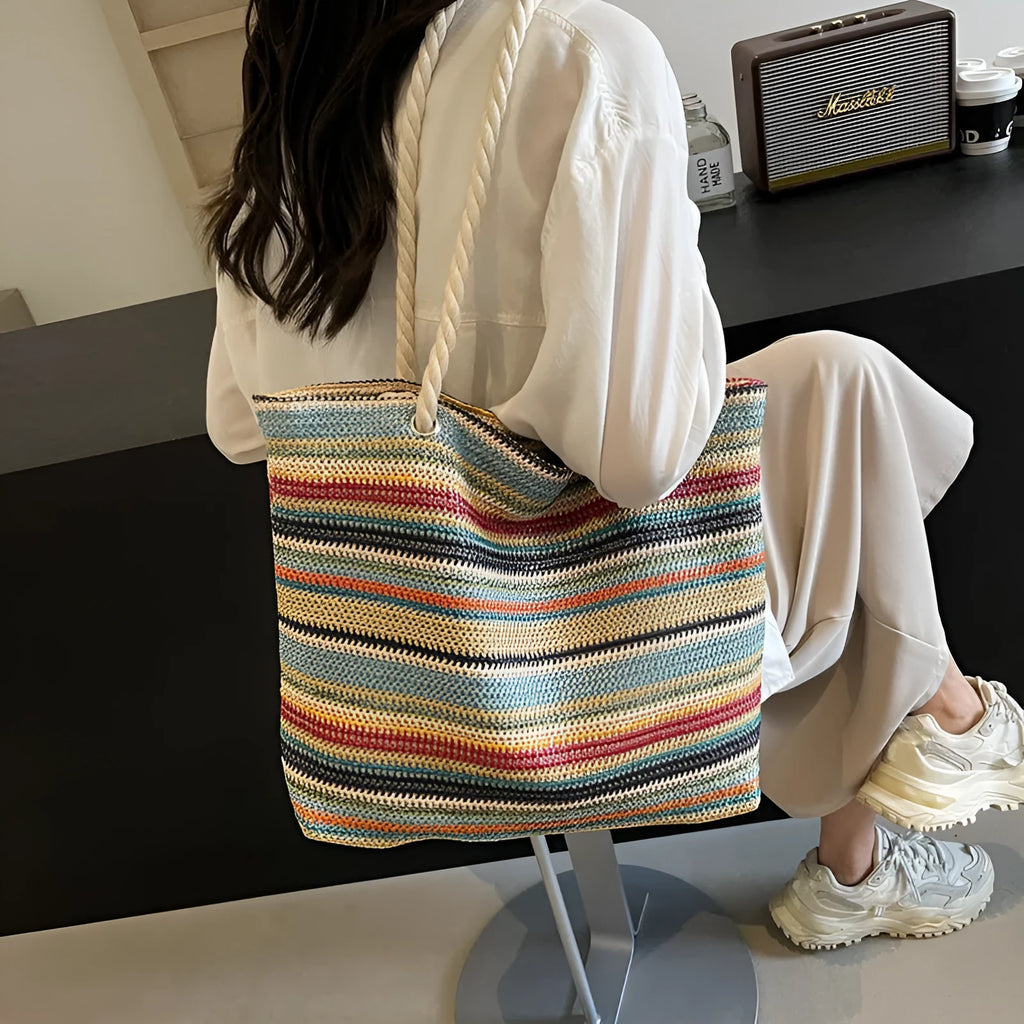 Blue straw woven nylon shoulder bag with single strap and polyester lining