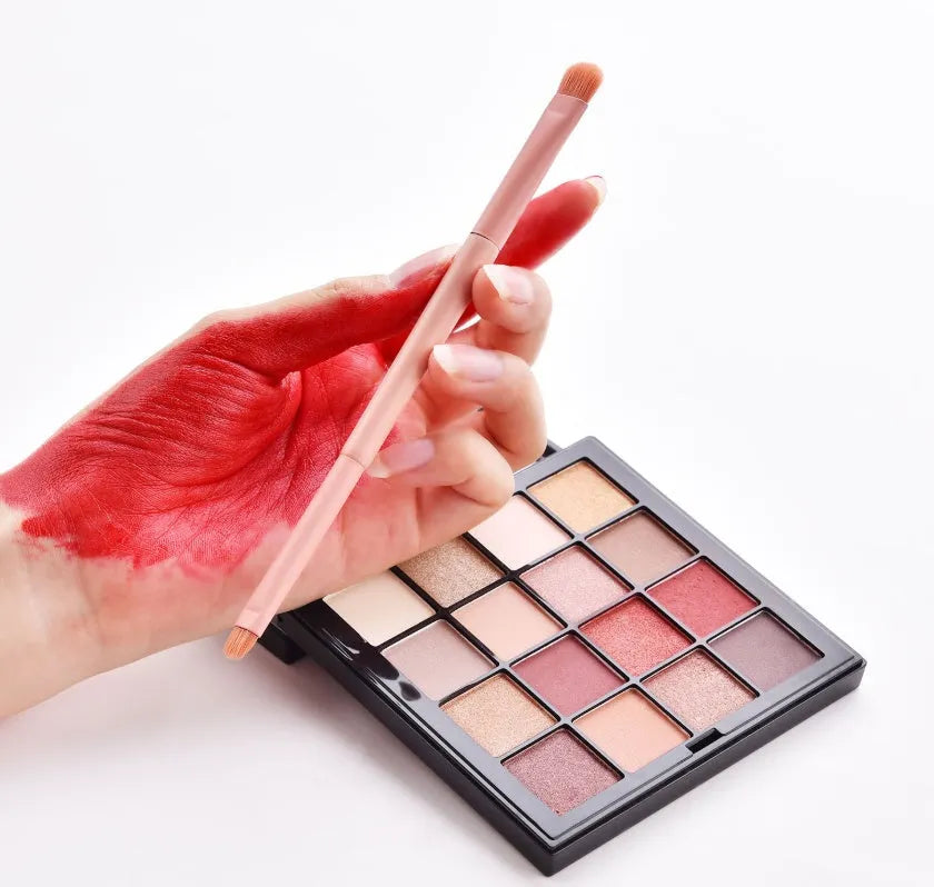Ten makeup brushes with wooden handles including powder, foundation, and detail brushes for complete face application