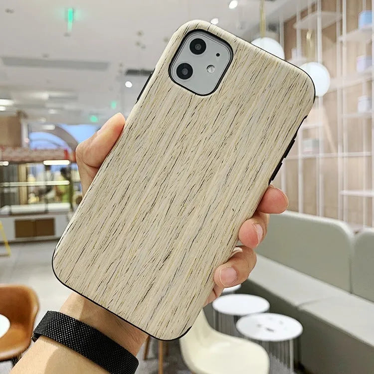 Wooden iPhone case showing rosewood, teak, and walnut finish options on compatible iPhone models