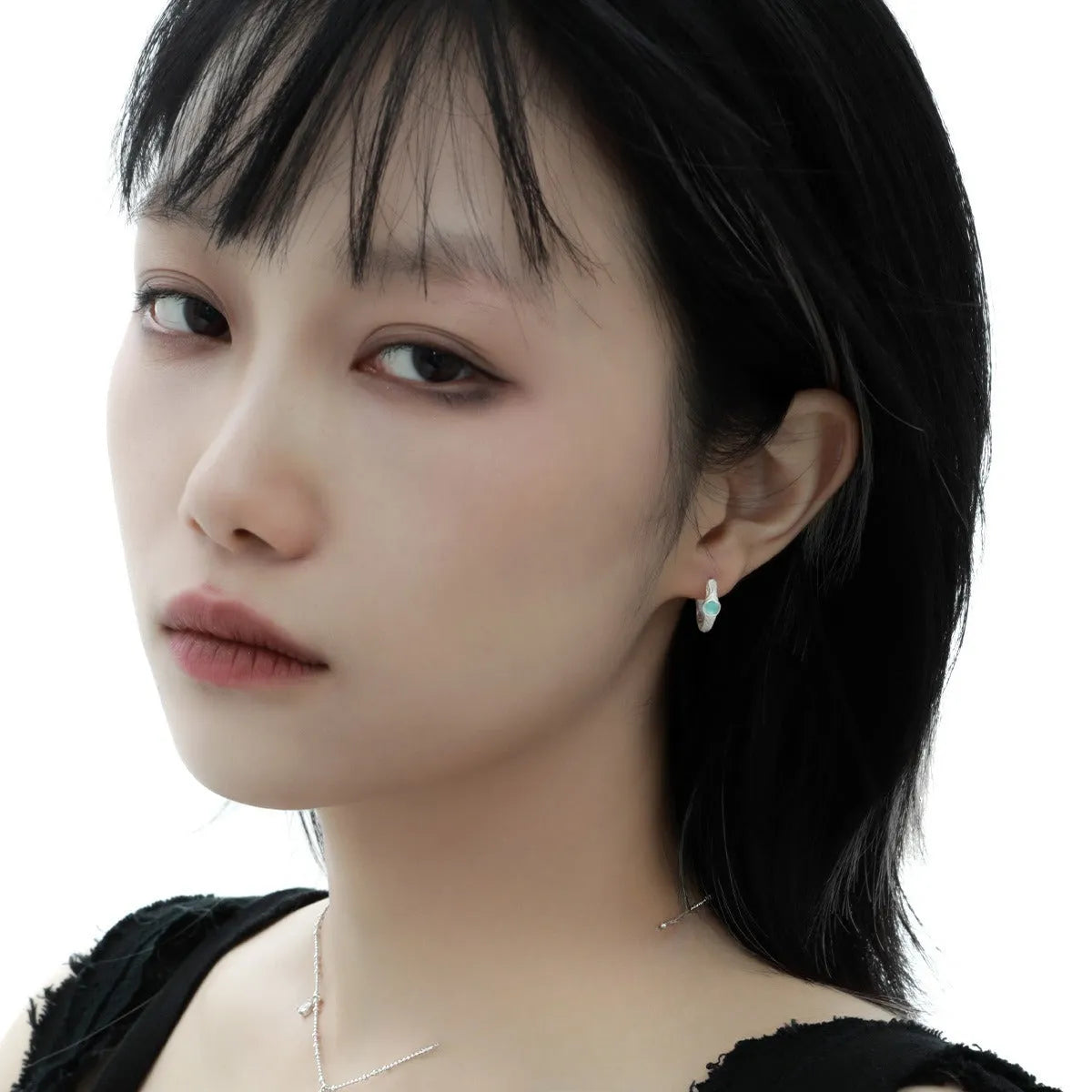 925 silver geometric ear clip with burnt silver electroplated finish and round design elements