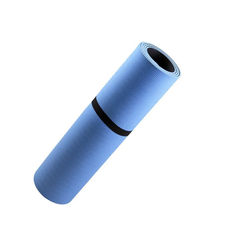 Blue yoga mat with plants pattern and a black grounding wire attached.