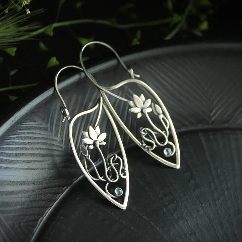 Pair of silver electroplated alloy lotus vine flower geometry earrings for women, retro style