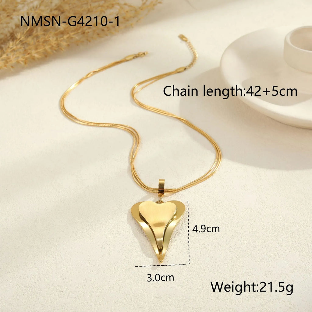 Women's geometric snake bones chain necklace with double heart design in gold or steel finish