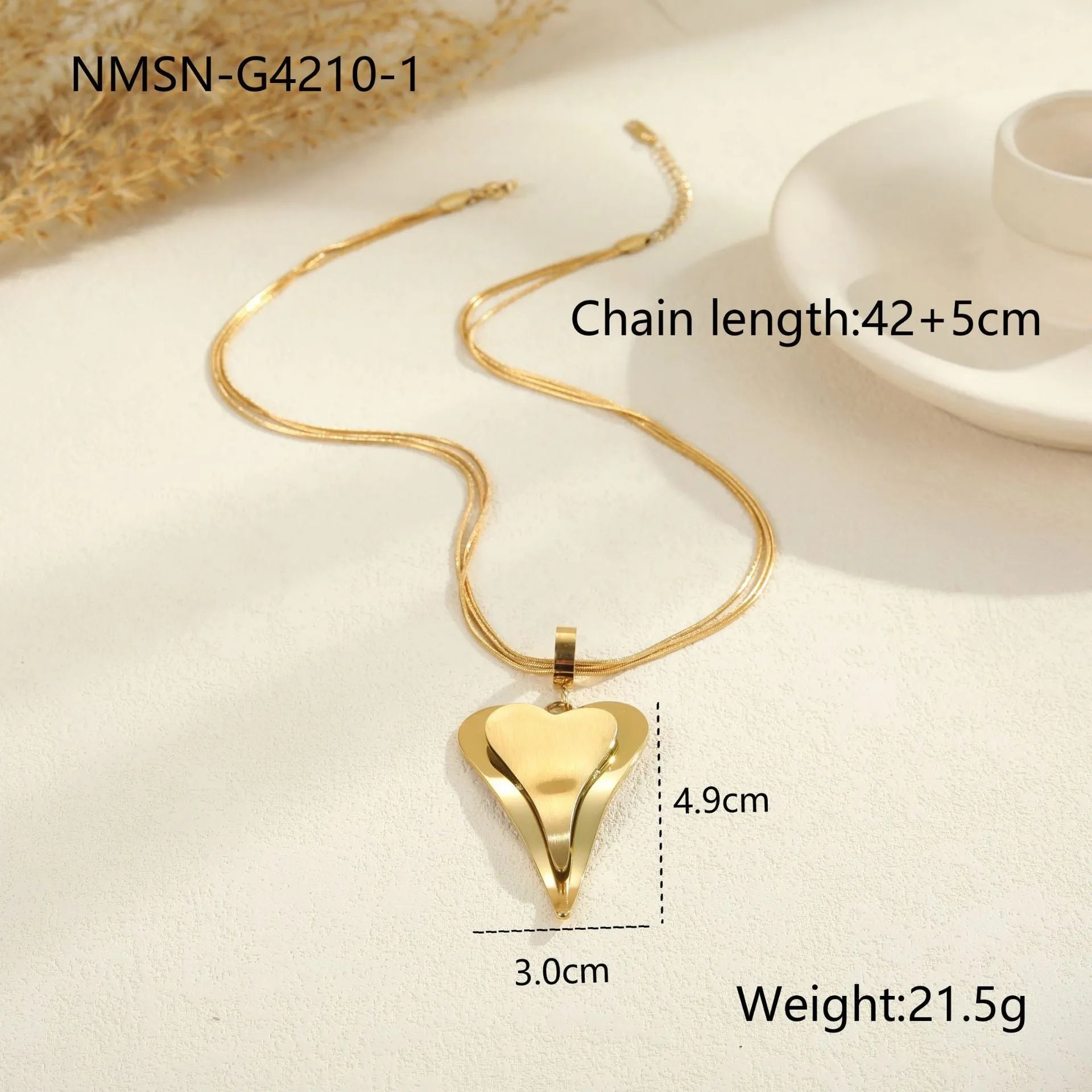Women's geometric snake bones chain necklace with double heart design in gold or steel finish