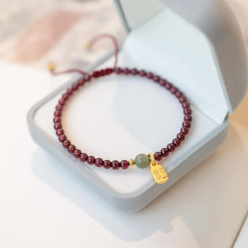 Hand-woven strawberry quartz crystal bracelet on red rope simple women's national tide style single piece