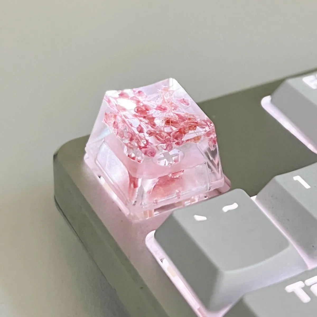 Transparent resin mechanical keyboard keycap showing starry sky galaxy design in multiple colour options