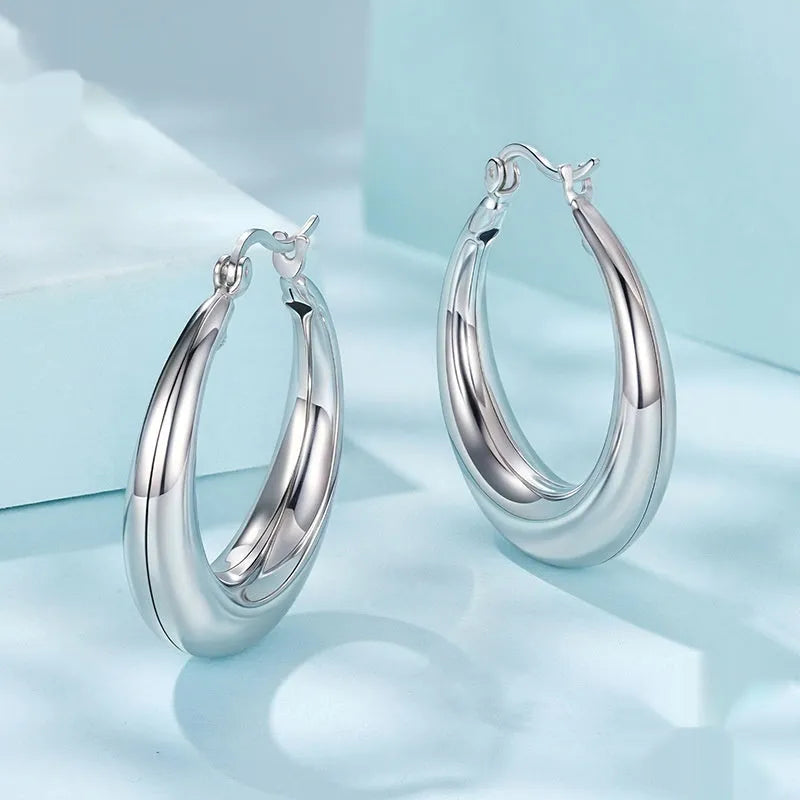 Geometric ring ear clip earrings in copper with silver electroplated needle