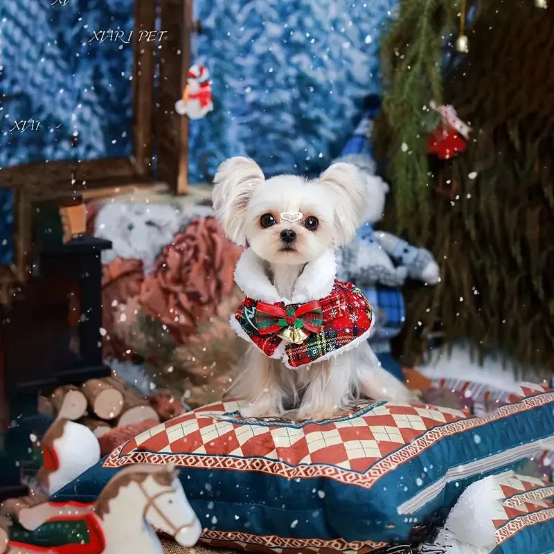 Red background pet Christmas cloak with bell design on dog, showing snowflake pattern and scarf length