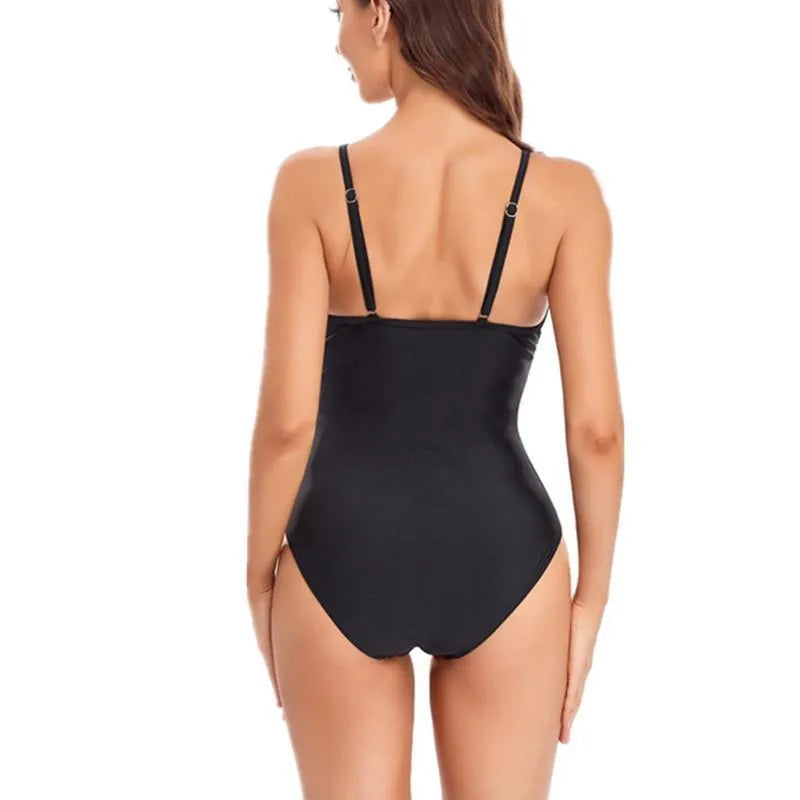 Ladies mesh solid colour one-piece swimsuit with backless design in black or blue, sizes S to XXL