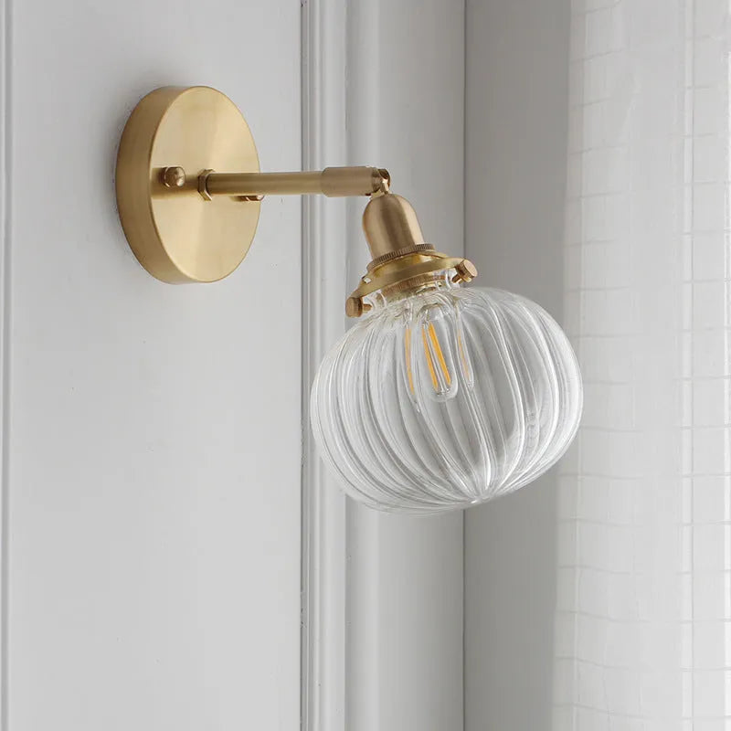 Pumpkin-shaped glass wall lamp with water ripple transparent finish for living room or bedroom