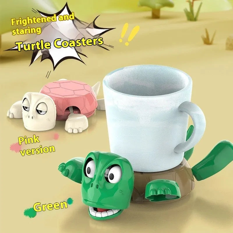 Turtle-shaped ABS plastic coaster in light green colour on a wooden table.