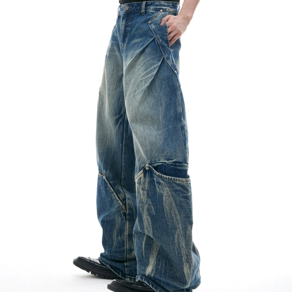 Men's verdant blue jeans with retro washed burst pattern and curved knife design, loose fit style