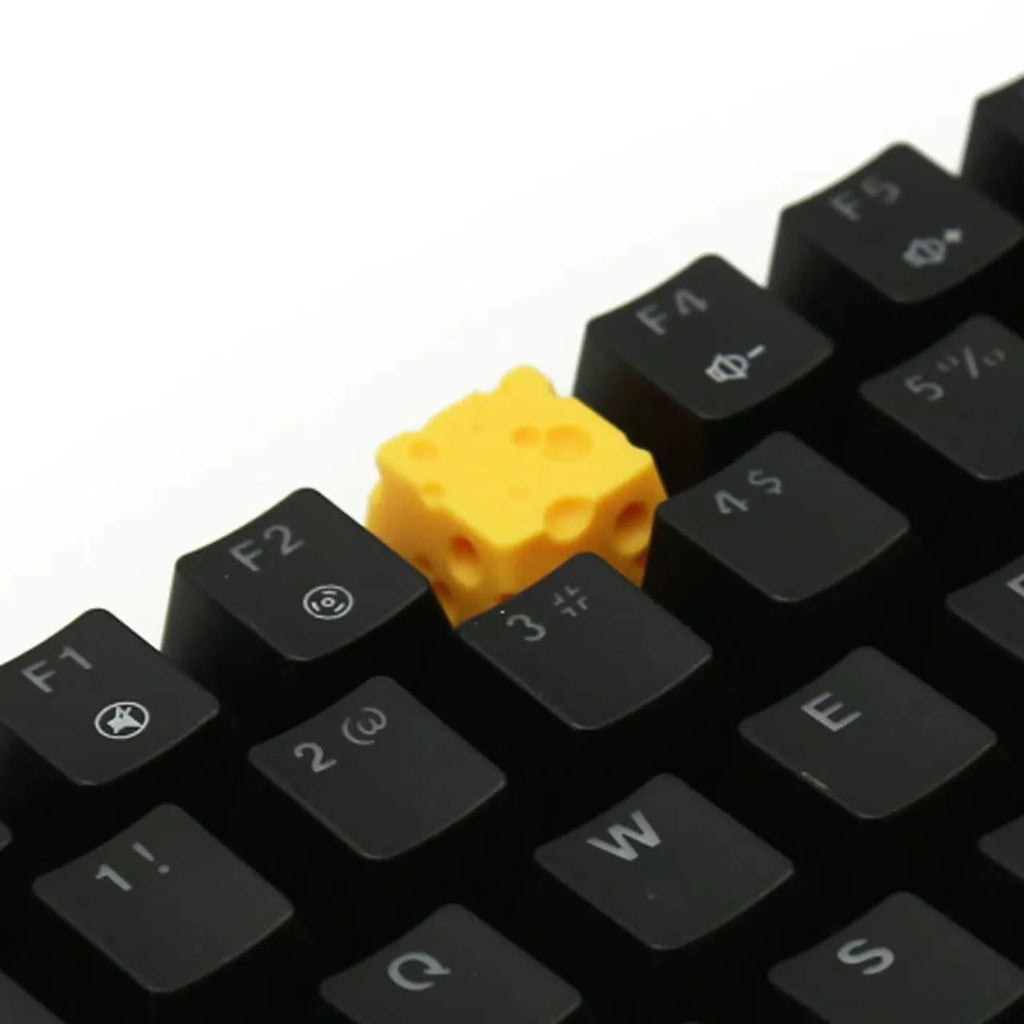 Yellow resin cheese key cap for mechanical keyboards with food-themed design