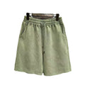 Men's loose fit distressed cotton shorts in straight leg cut with fifth pants length