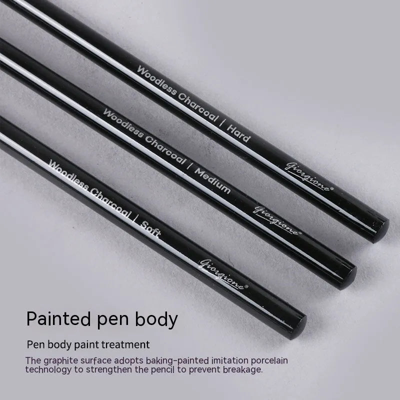 Set of six graphite pencils and three carbonized pencils in wooden casings on suction card packaging.
