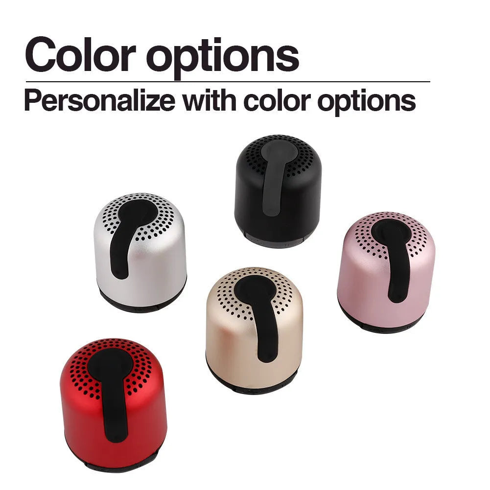 Hieha XQ11 mini cylinder Bluetooth speaker in black, gold, pink, red, or silver colour.
