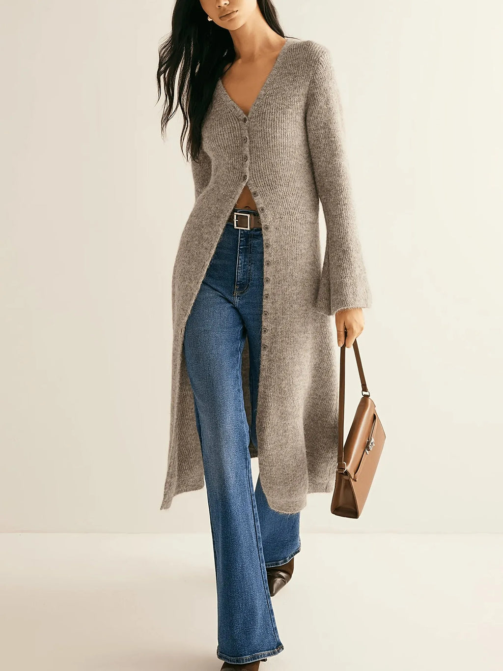 Retro French style long sleeve cardigan coat in khaki with button front on a woman, soft acrylic and viscose blend