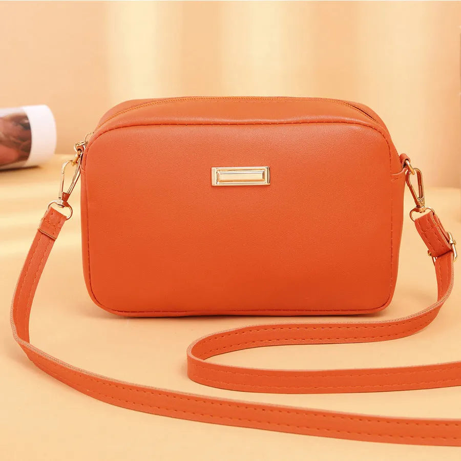 Women's solid colour PU shoulder bag with three-dimensional pockets and horizontal square shape