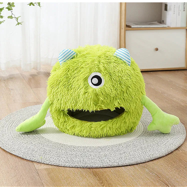Round fluffy cat bed with soft plush surface and non-slip base