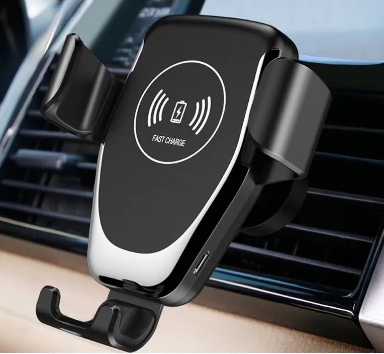 Car wireless charger with automatic gravity clamp mounted on vehicle vent, charging an iPhone