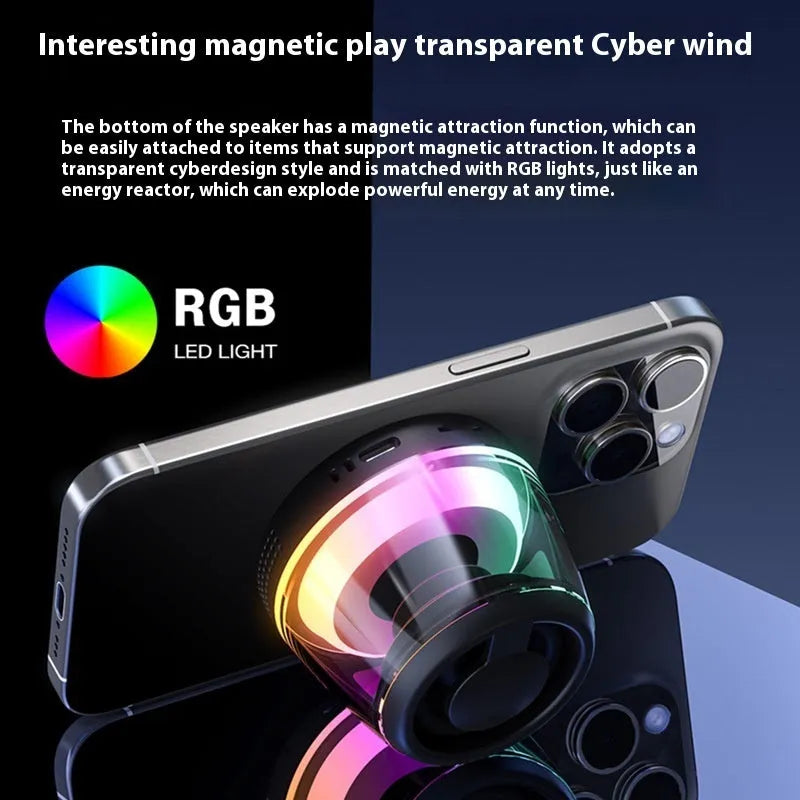 Black and white portable Bluetooth speaker with ambient lighting and magnetic base
