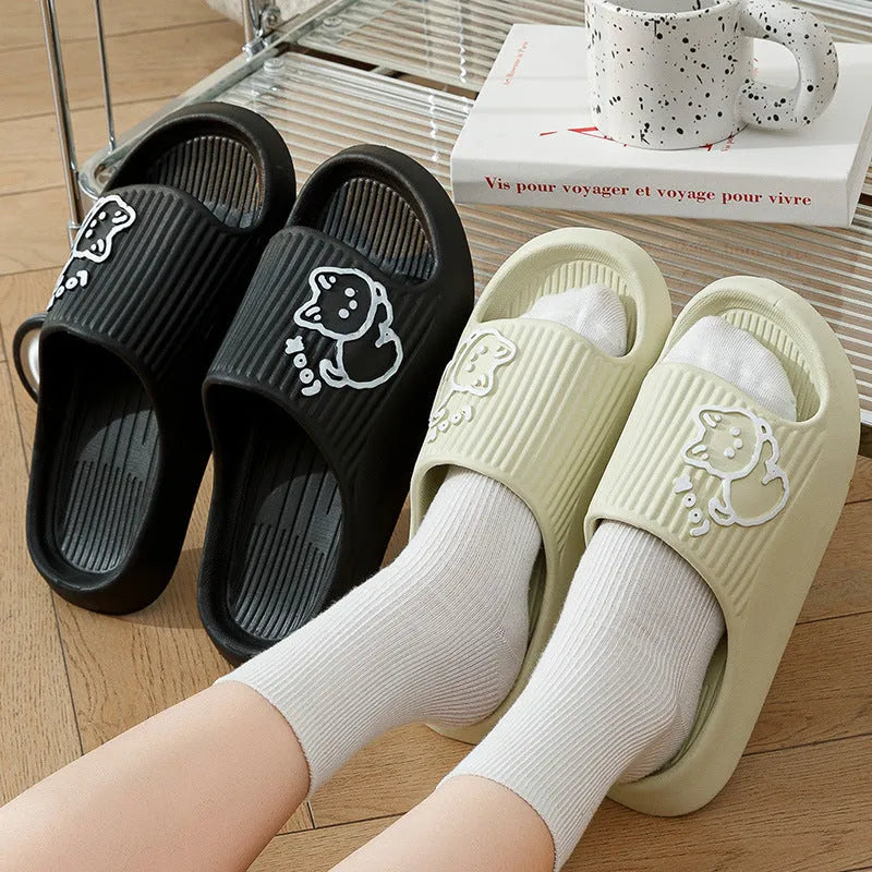 Women's green EVA flip-flop slippers with cute cat design and thick platform sole.