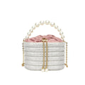 Women's retro style crossbody bag with beaded pearl detail on soft PU material in rounded suitcase shape