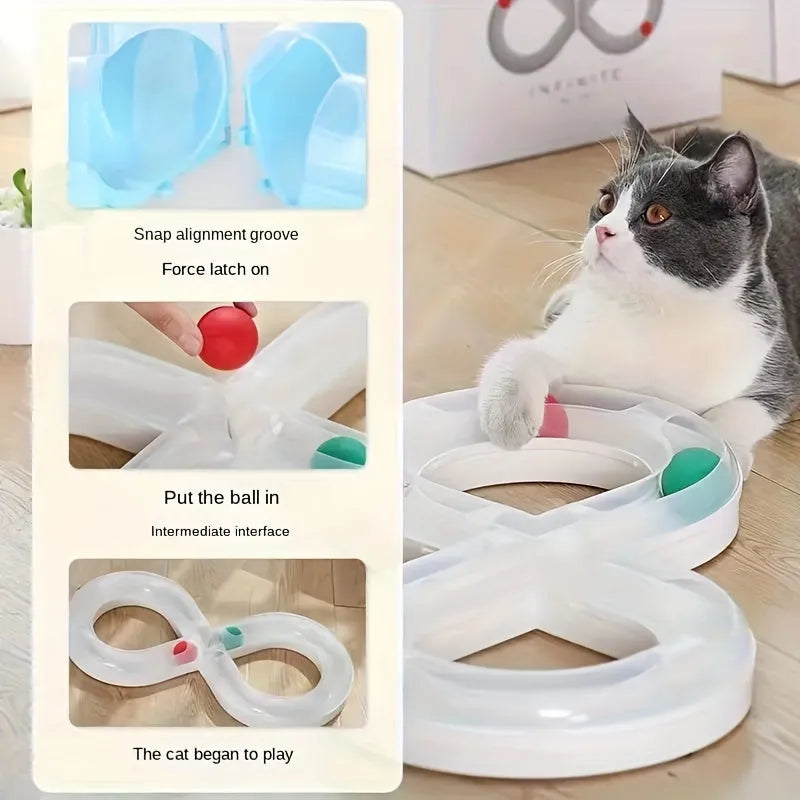 Blue and white cat toy set with a turntable track ball and a teasing stick on a floor.