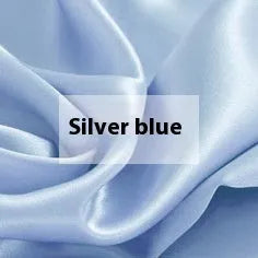 Silk double-sided duvet cover showing reversible design in solid colours including lotus pink, pea green, and bright brown